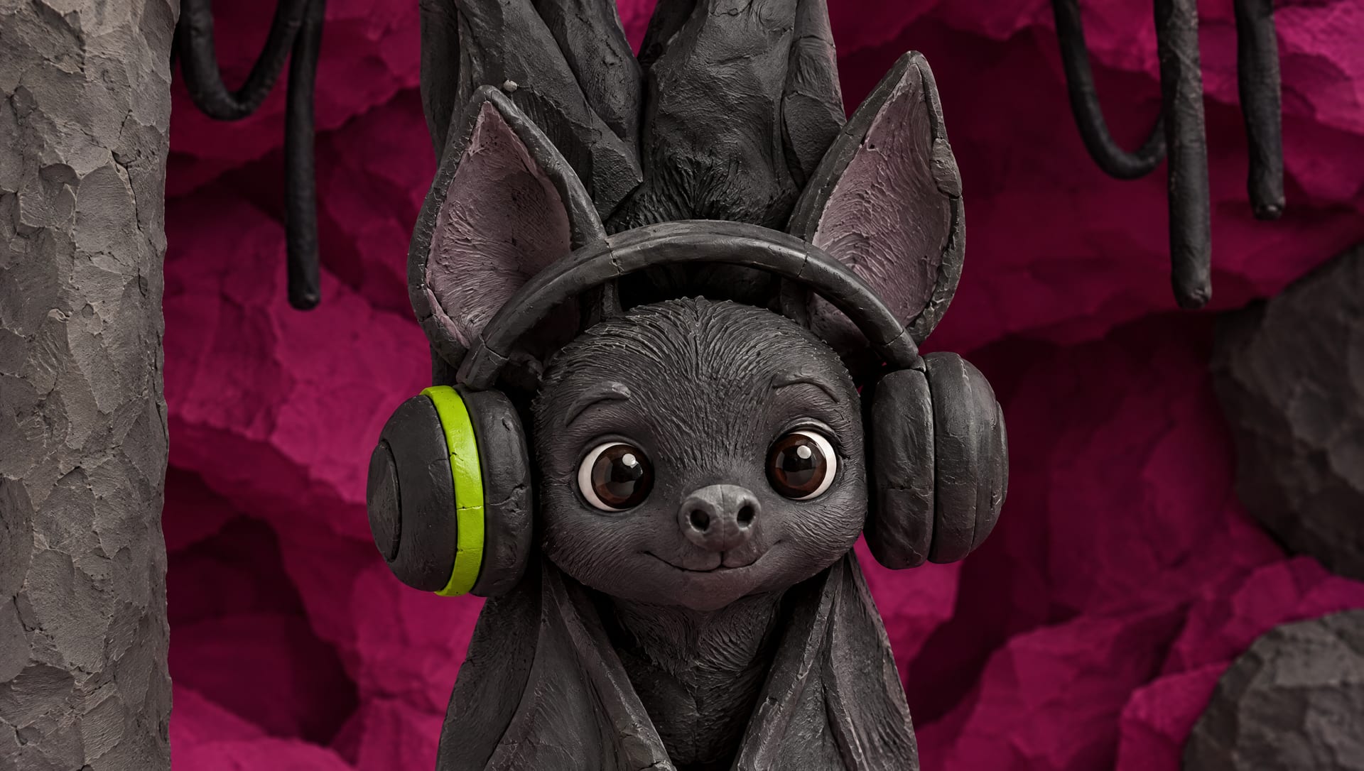 Close on the bat's ears and its headphones with a lime ring